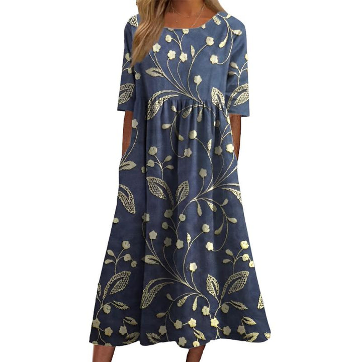 Margaux – Tyylikäs midimekko kukkakirjonnalla